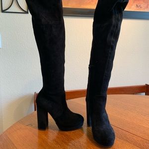 Thigh high black boots